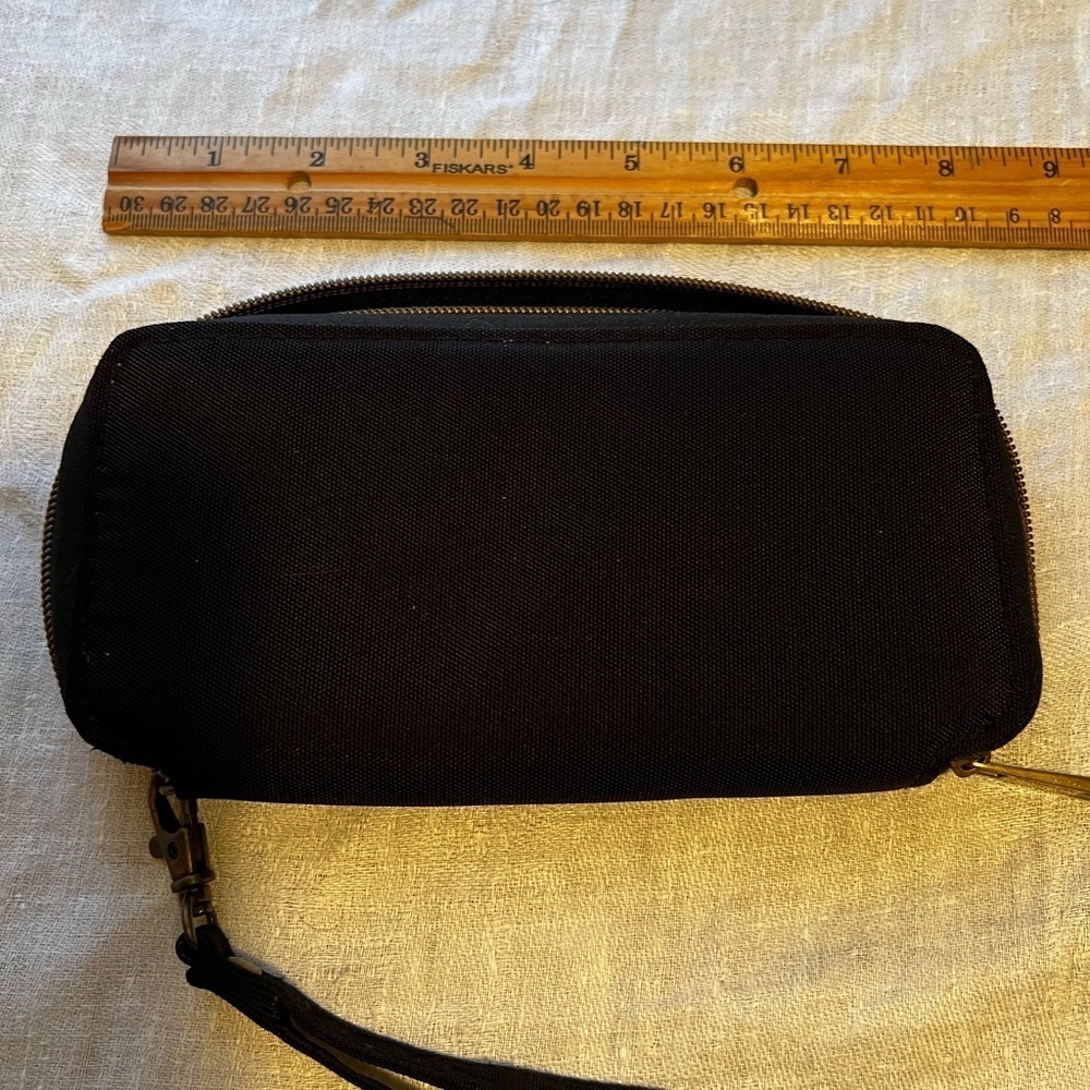 Travelon wallet in black. Zipper close. Wristlet strap. Great for travel. - Picture 3 of 6